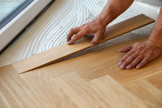 Professional flooring installation in progress
