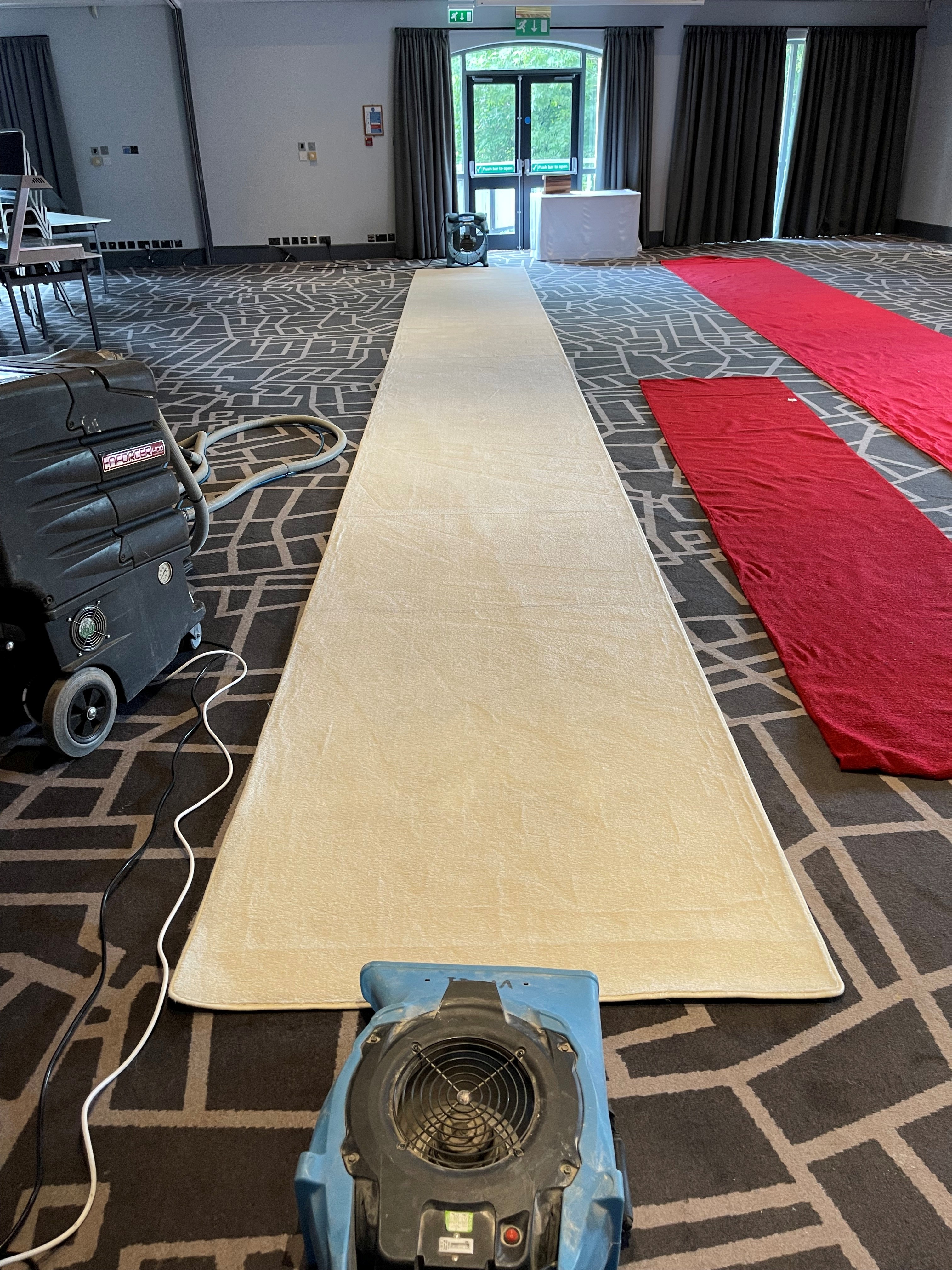“Professional hotel wedding runner carpet cleaning – 25 metre runner restored to luxury finish”